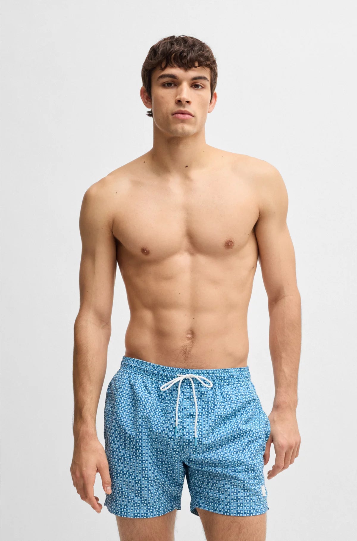 PRINTED SWIM SHORTS WITH LOGO BADGE
